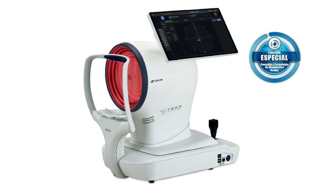 Ophthalmic imaging device with a large red circular lens and a mounted touchscreen monitor for eye diagnostics, shown with a special edition badge nearby.