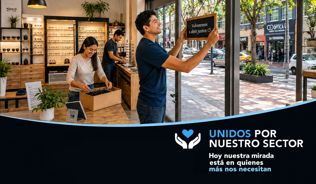 Man hangs a sign reading 'Volveremos a abrir juntos' inside an eyewear shop while a colleague selects frames, with glasses on shelves nearby.